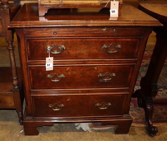 A 19th century style walnut chest with brushing slide and three drawers, Width 66cm